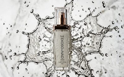 nano-banana-2_Photorealistic_luxury_editorial._Serum_bottle_centered_with_a_dramatic_frozen_wa-0